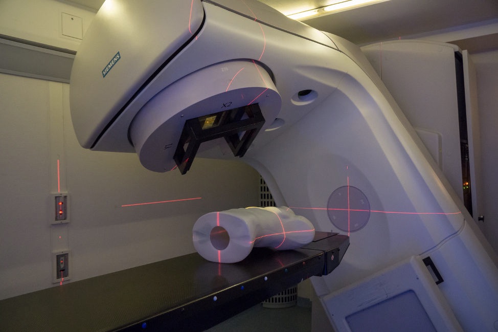 Gantry for radiation therapy with cross line lasers and dummy